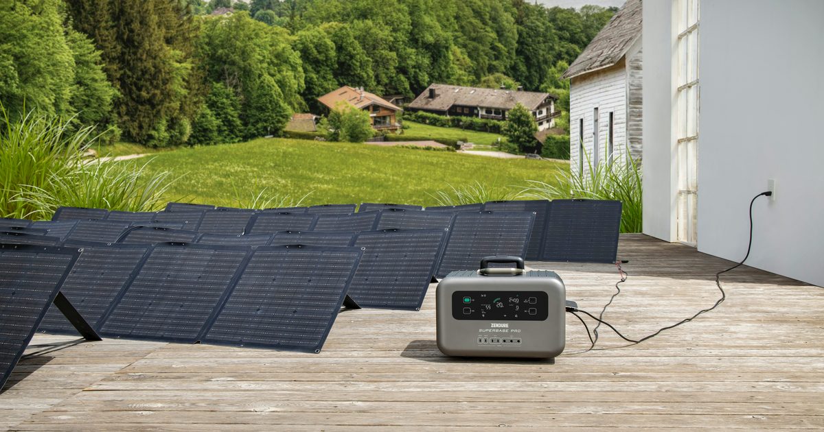 Portable solar panel and power station powering a home workspace